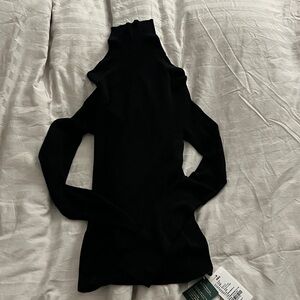 Elegant thin Black Turtleneck wool sweater for Women